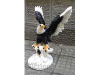 A very beautiful large colored eagle made of plaster
