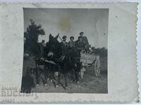 Military musicians in a wagon