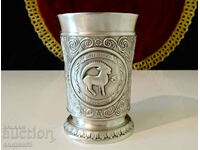 Capricorn pewter cup.