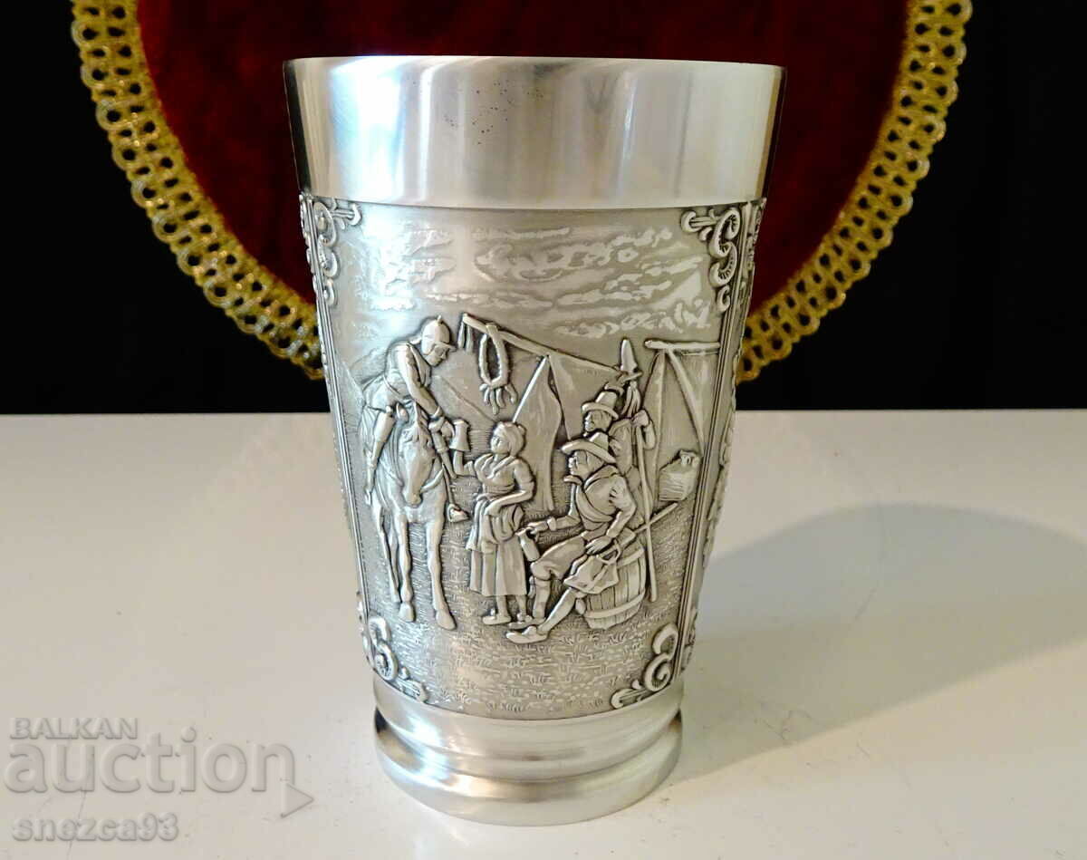 Cup, tin mug, hunting theme. Cup, tin mug, hunting theme.