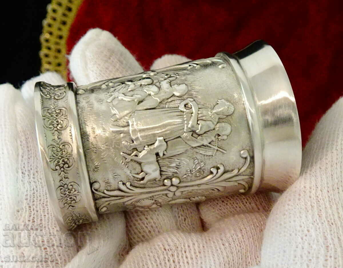 Cup, shot pewter with farm pictures.