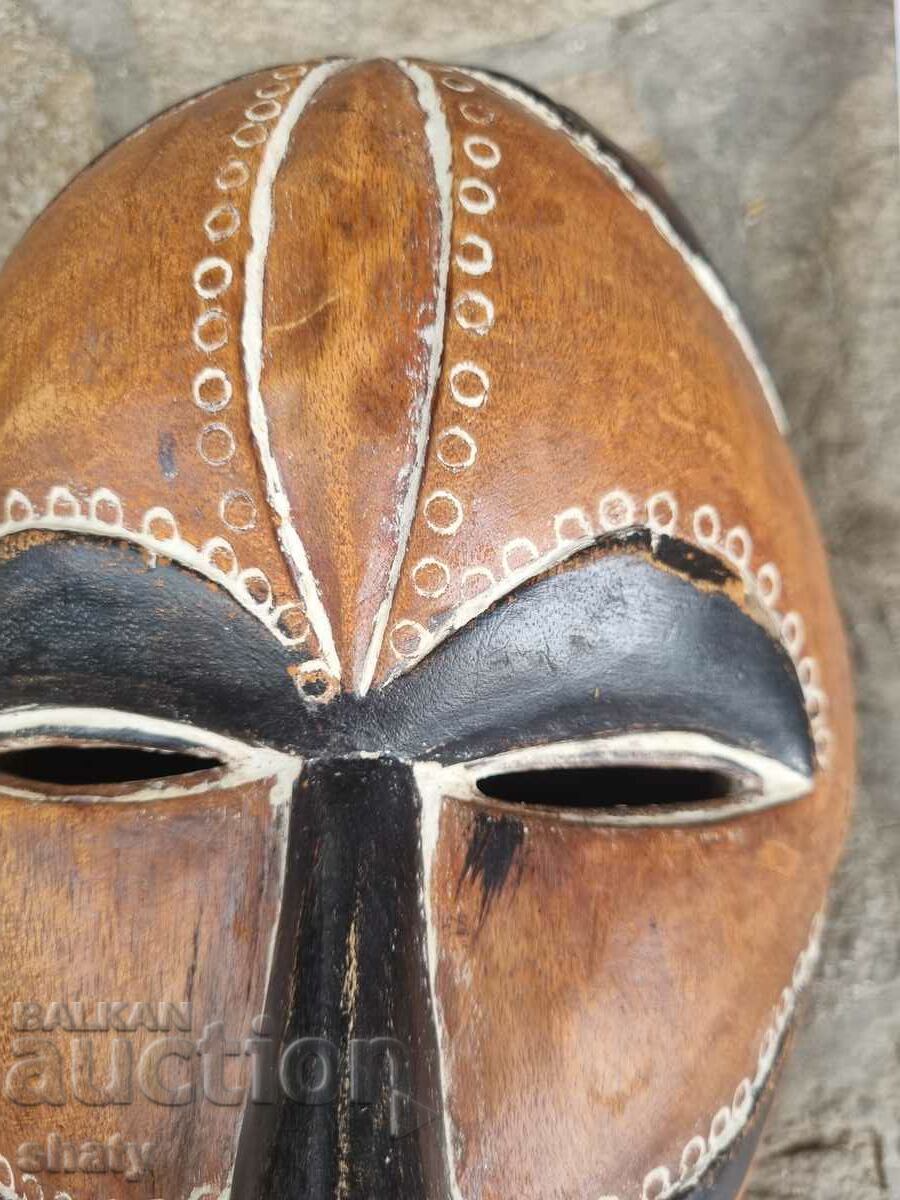 Old wooden African mask with price 55.00 BGN | € 28.12 Old wooden African mask with price 55.00 BGN | € 28.12