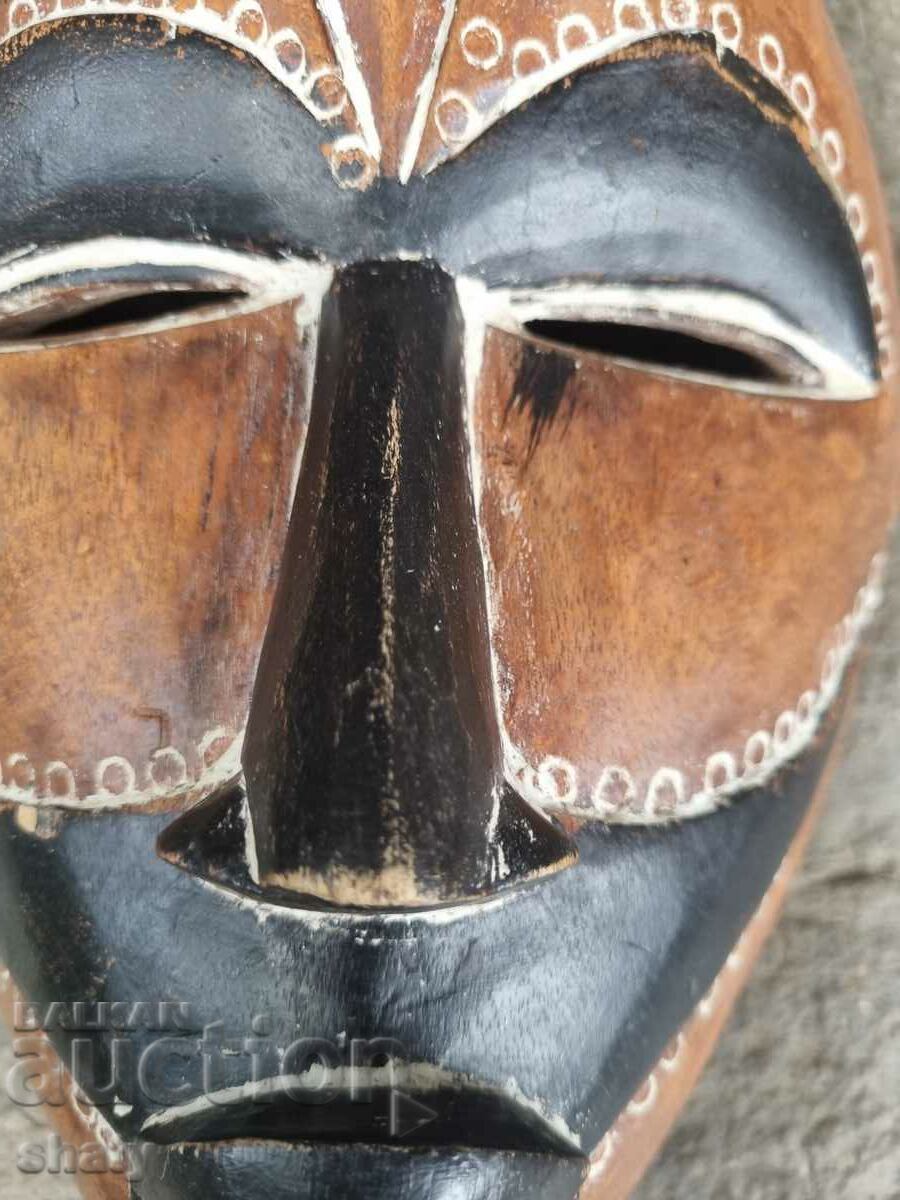 Auction Old wooden African mask Auction Old wooden African mask