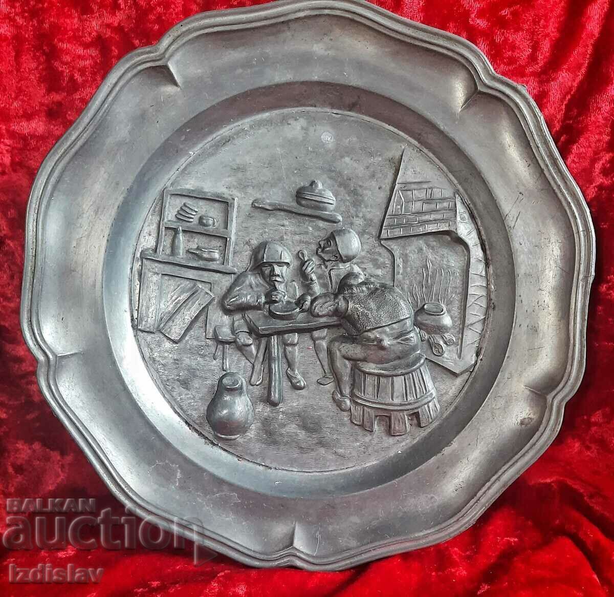 Old pewter wall plate with drinking soldiers Old pewter wall plate with drinking soldiers