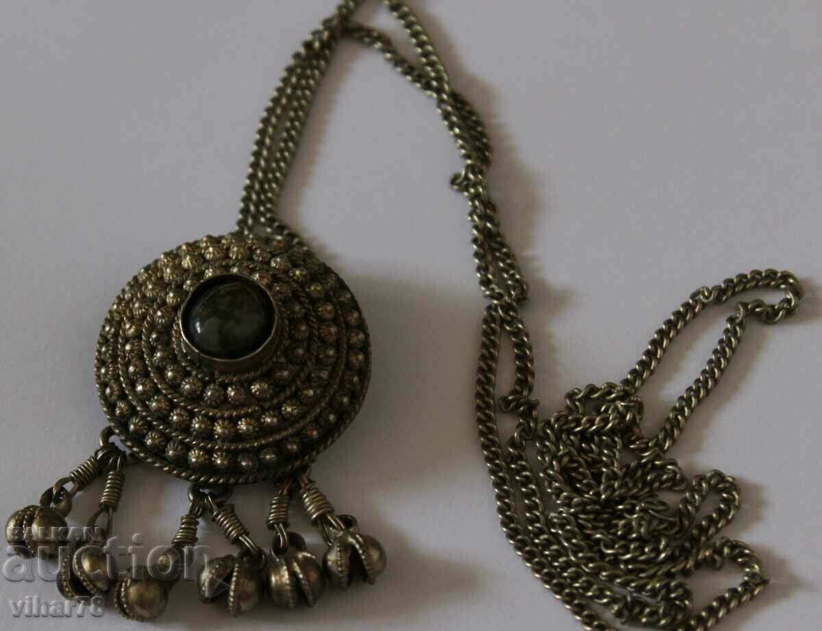 Old medallion-sachan