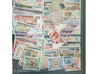 Pack of different 100 banknotes all over the world - different
