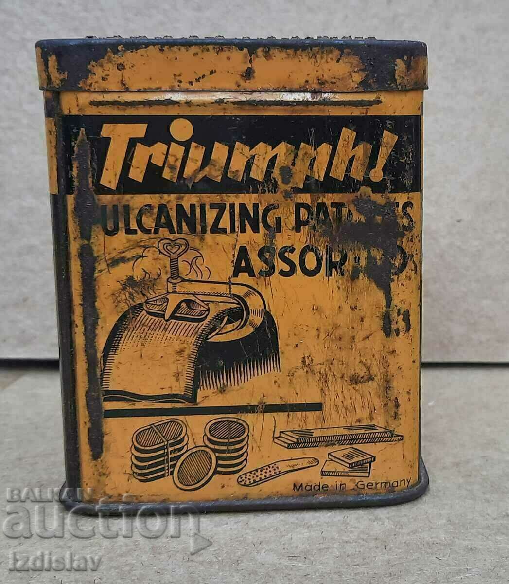 Old collectible Triumph tin box