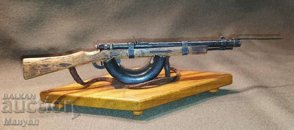 Old Mosin Nagan rifle miniature.