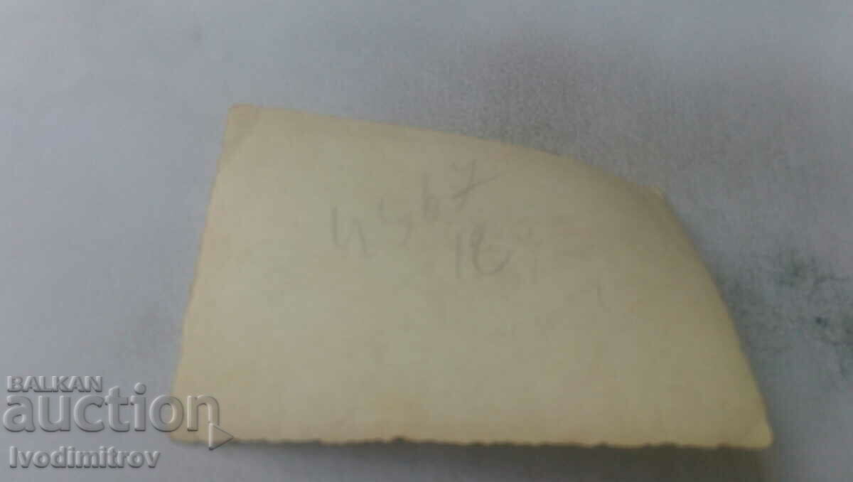 Photo Sofia Three men in front of the store of Marina K. Abadzhieva with price 2.65 BGN | € 1.35