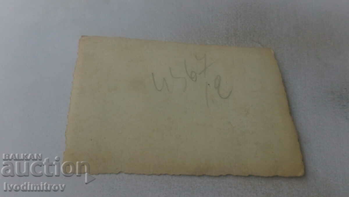 Photo Sofia Three men in front of the store of Marina K. Abadzhieva with price 2.65 BGN | € 1.35 Photo Sofia Three men in front of the store of Marina K. Abadzhieva with price 2.65 BGN | € 1.35