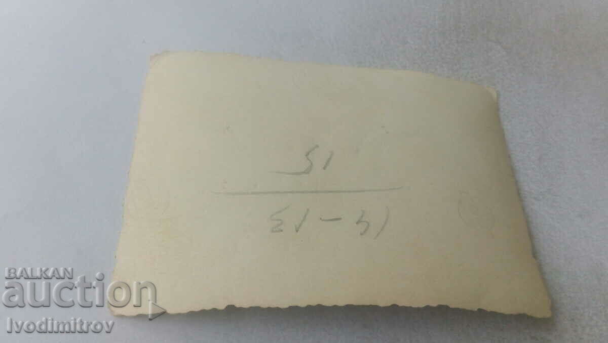 Photo Sofia Two men, a woman and two boys on the sidewalk with price 2.65 BGN | € 1.35