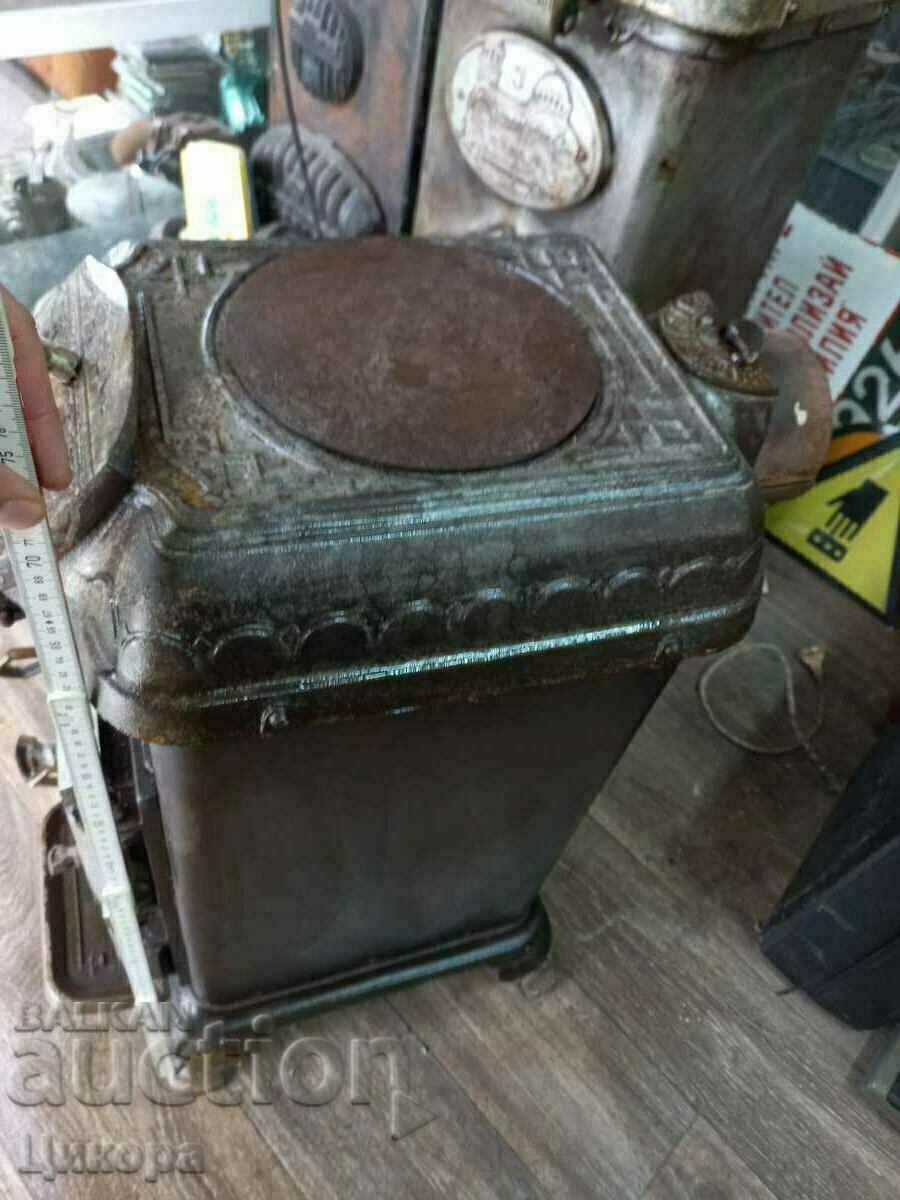 Delivery of OLD CAST IRON STOVE PERNIK KINGDOM OF BULGARIA