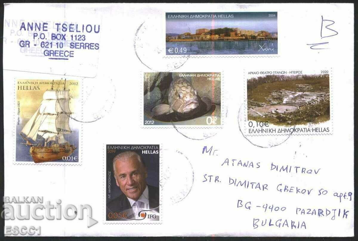 Traveled envelope with stamps Fish, Ship 2012, Landscape 2004 from Greece