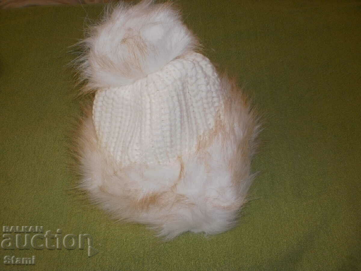 Machine-knit wool hat with leather cuff and tassel, white with price 18.00 BGN | € 9.20 Machine-knit wool hat with leather cuff and tassel, white with price 18.00 BGN | € 9.20