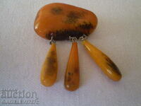 Old lady's amber brooch