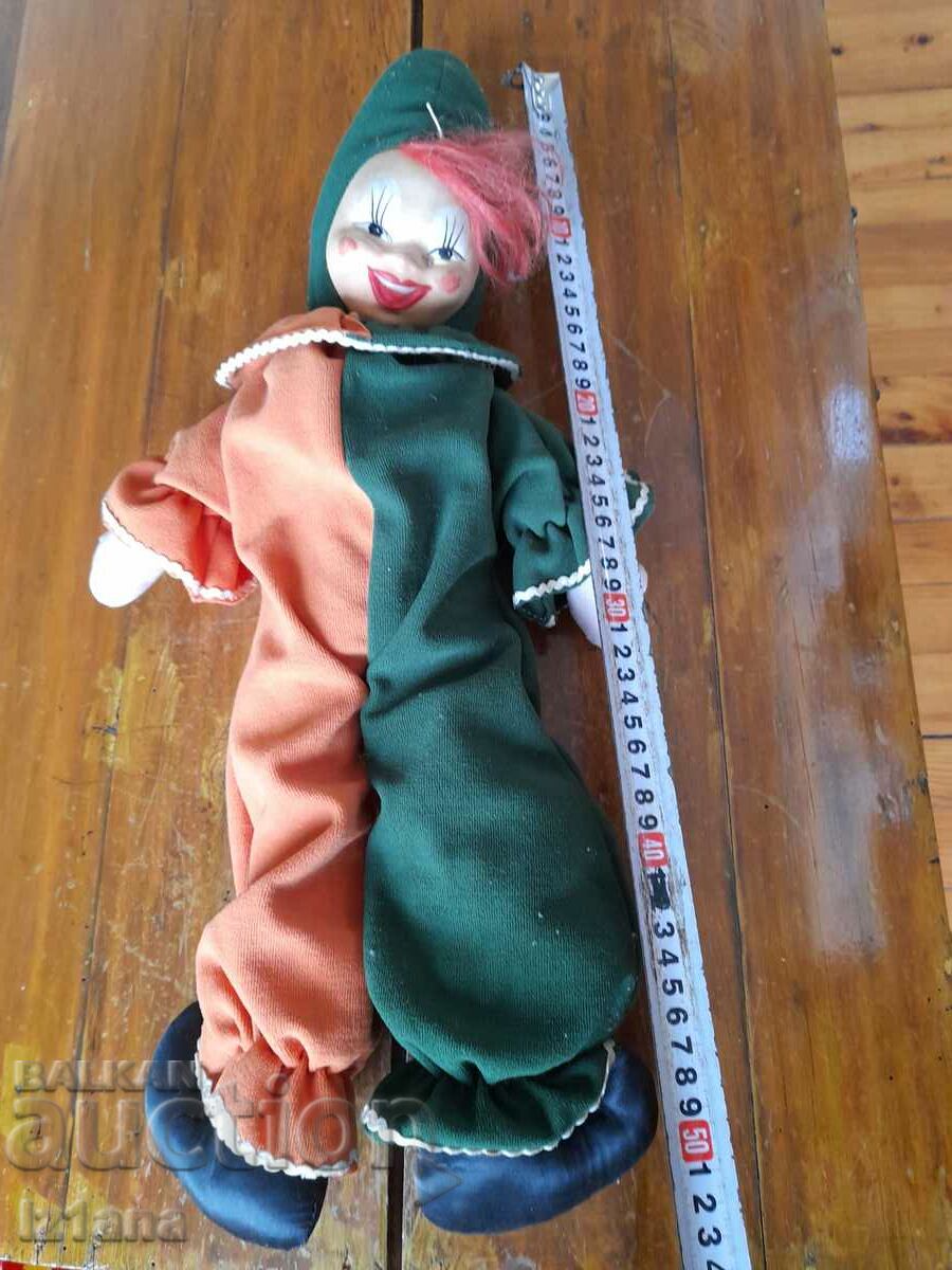 Delivery of Old doll, clown