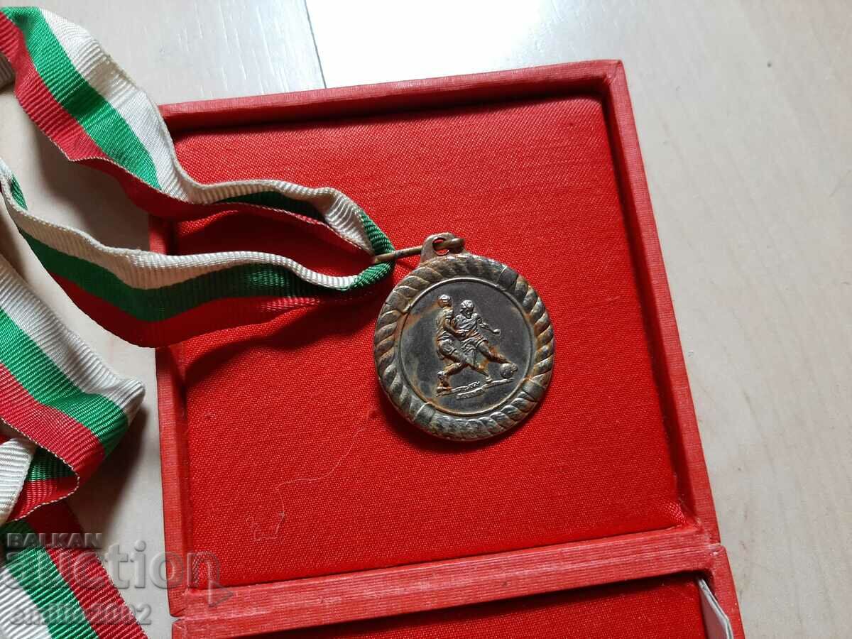 Auction Football plaque and medal Auction Football plaque and medal