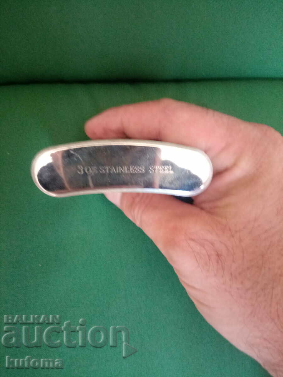 Auction Metal whiskey bottle Auction Metal whiskey bottle