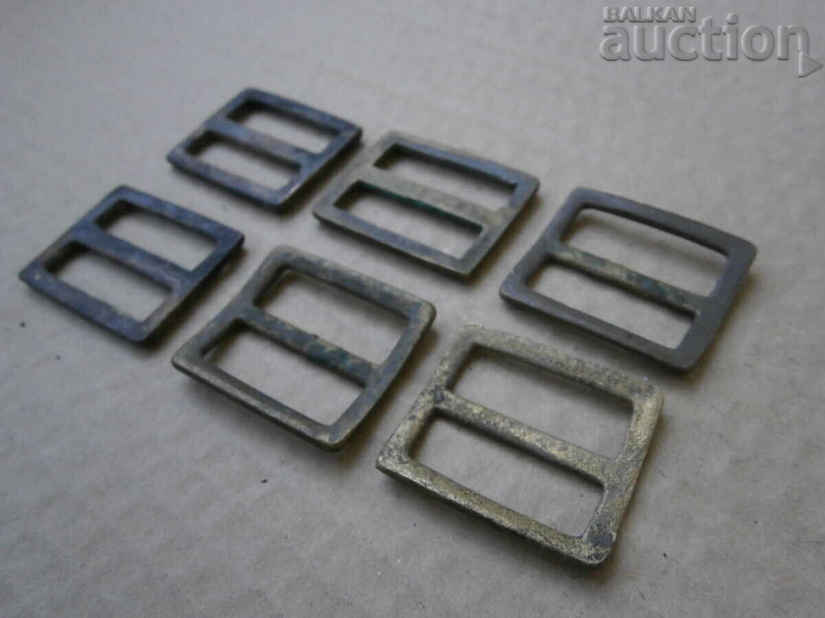 Delivery of old bronze buckles distributors for a dull leather belt Delivery of old bronze buckles distributors for a dull leather belt