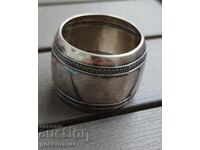 An old silver napkin holder!