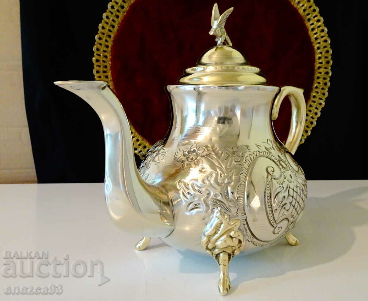 Auction  Moroccan bronze teapot, jug, eagle, ornaments