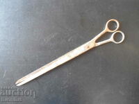Old scissors marked