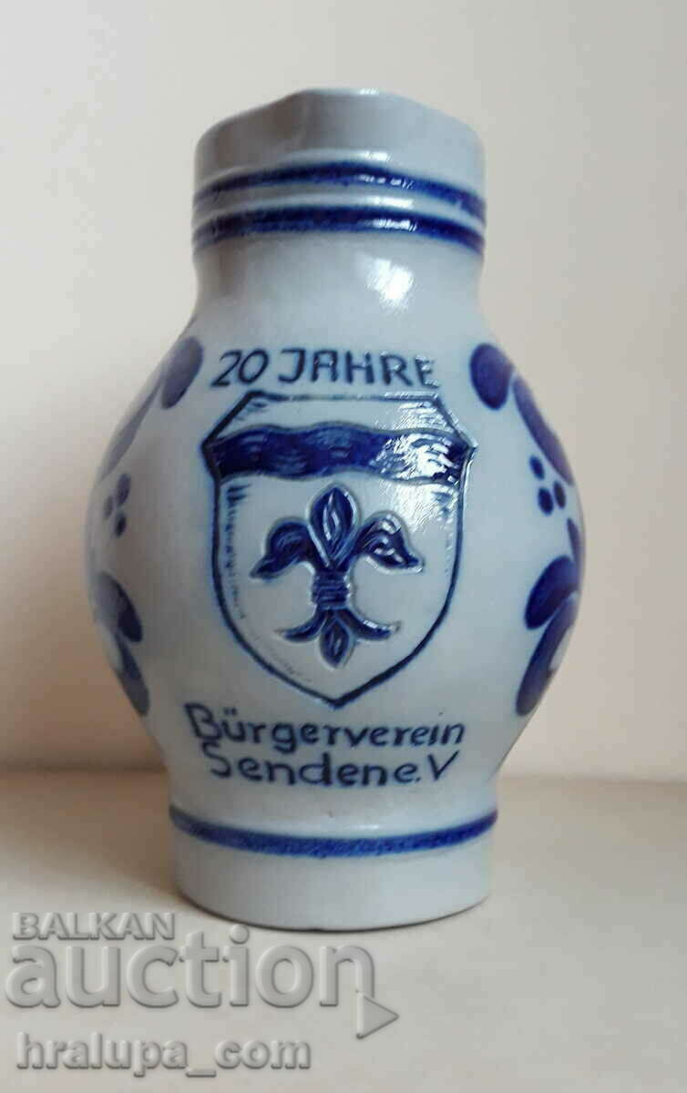 Auction Hand painted ceramic jug Auction Hand painted ceramic jug