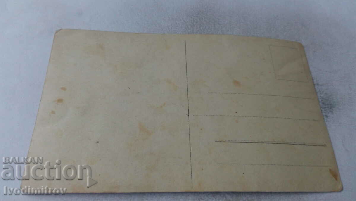 Photo Woman in a black dress with price 1.35 BGN | € 0.69 Photo Woman in a black dress with price 1.35 BGN | € 0.69