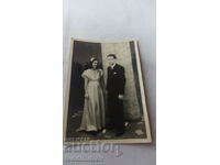 Photo Young man and young girl in formal wear