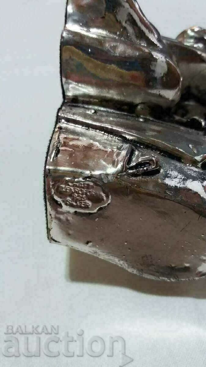 Delivery of Vintage figure composition with silver plating and printing Delivery of Vintage figure composition with silver plating and printing