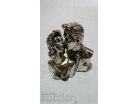 Vintage figure composition with silver plating and printing