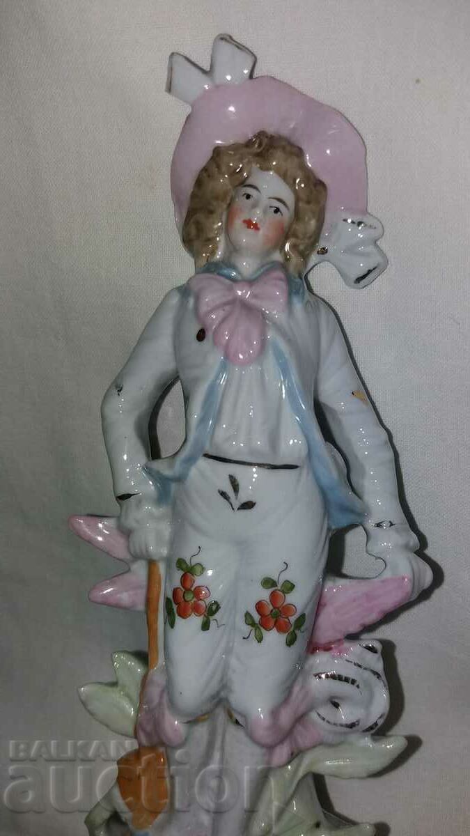 Old porcelain plastic figure