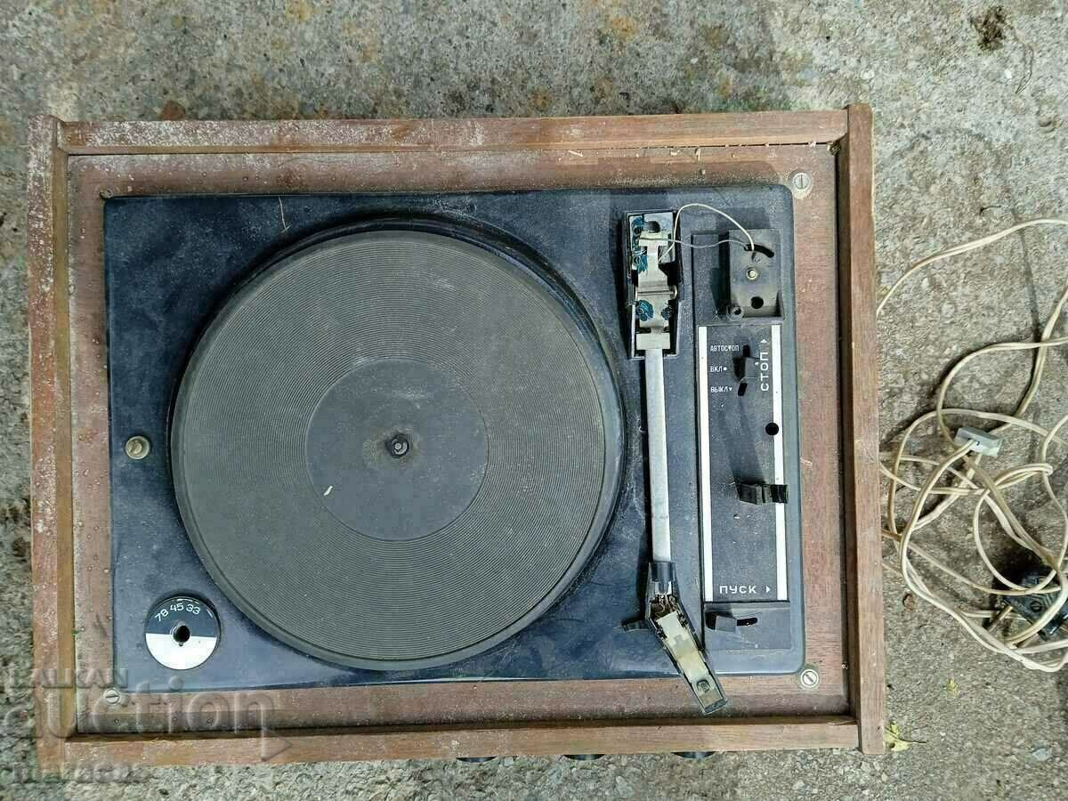 Old electric record player with records
