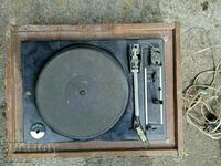 Old electric record player with records