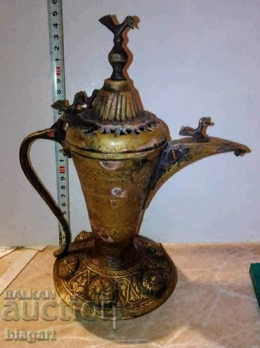 Oriental pot for coffee on sand, kettle with jugri, brass, bronze