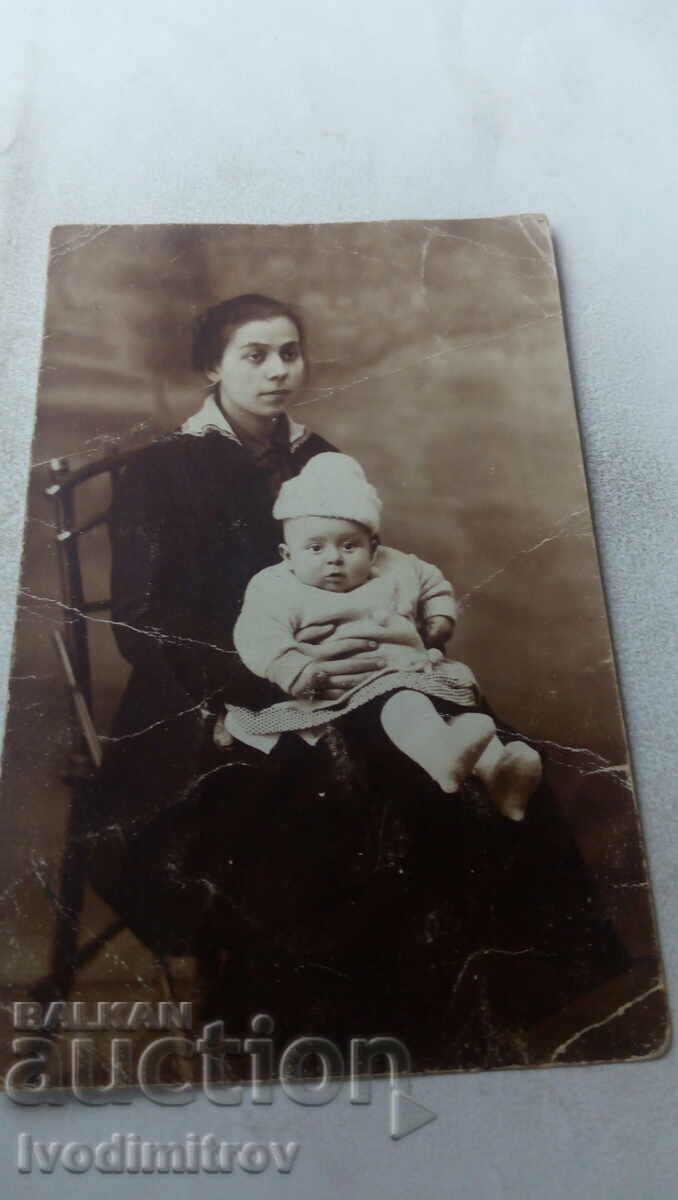Photo Tatar Pazardzhika Young woman with a baby in a chair 1922