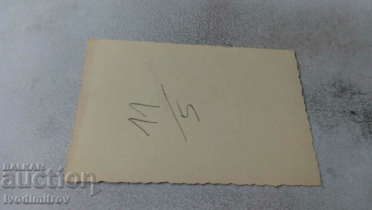 Photo Man in a swimsuit on a wooden platform on the beach with price 2.65 BGN | € 1.35 Photo Man in a swimsuit on a wooden platform on the beach with price 2.65 BGN | € 1.35