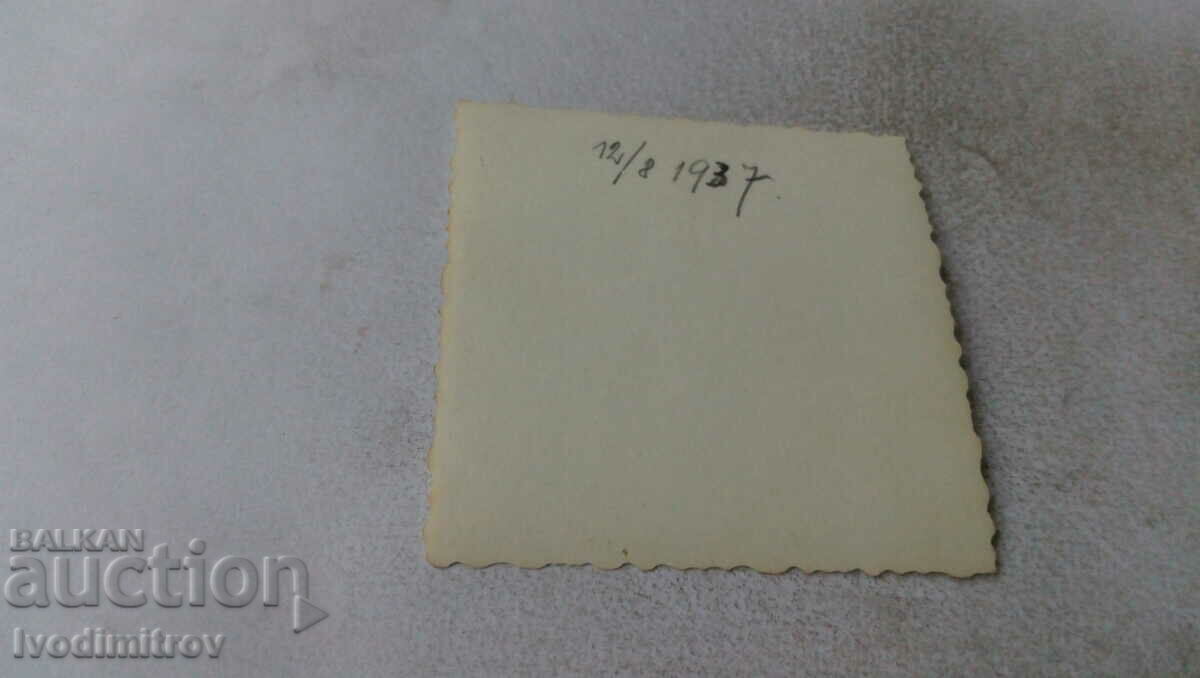 Photo A young man and a young woman on a wooden platform by a lake with price 1.65 BGN | € 0.84 Photo A young man and a young woman on a wooden platform by a lake with price 1.65 BGN | € 0.84