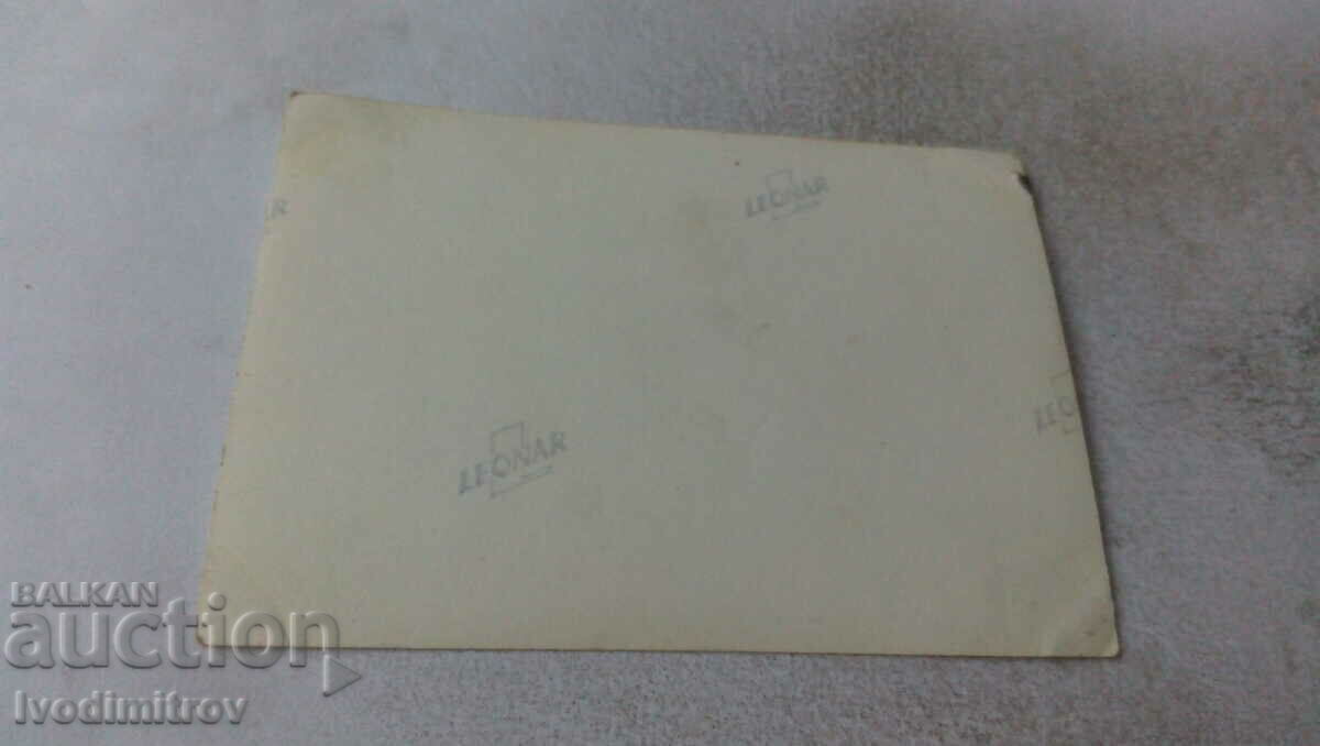 Photo Young men and women on the beach with price 1.85 BGN | € 0.95