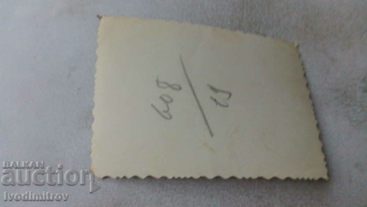 Photo Men and women in front of an old house with price 1.65 BGN | € 0.84 Photo Men and women in front of an old house with price 1.65 BGN | € 0.84