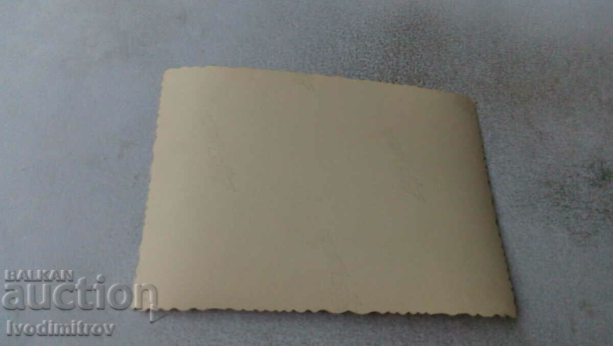 Photo Men in front of a monument with price 0.75 BGN | € 0.38 Photo Men in front of a monument with price 0.75 BGN | € 0.38