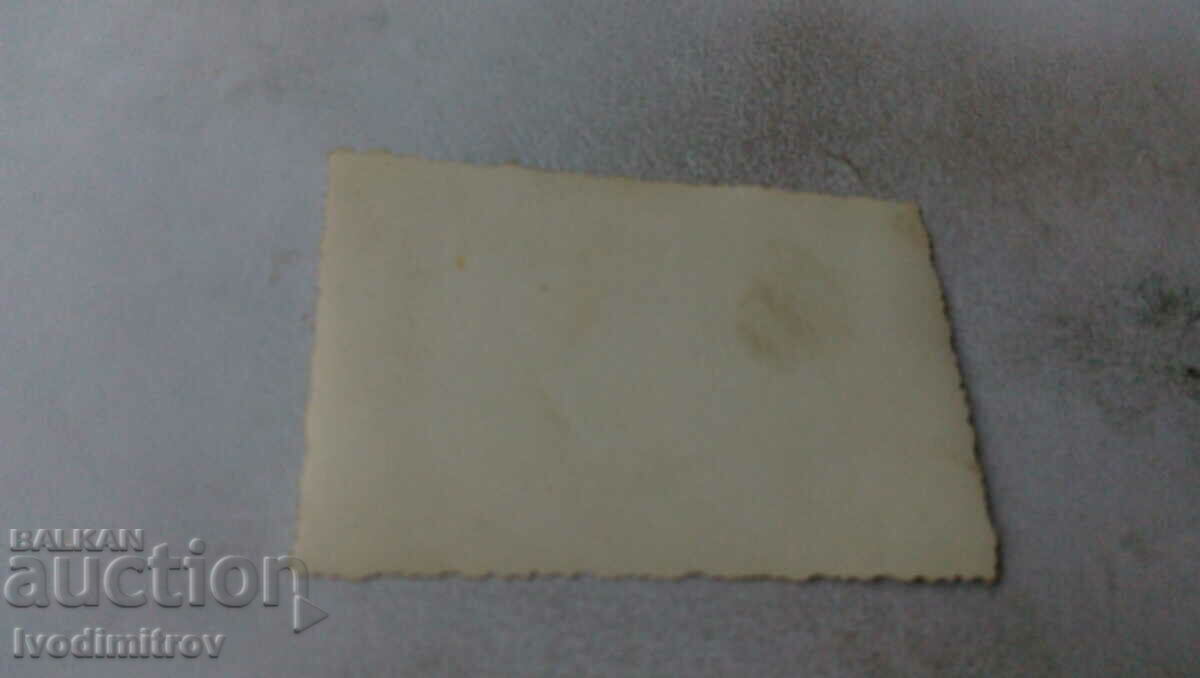 Photo Man women and children on a bench by a fence with price 1.35 BGN | € 0.69 Photo Man women and children on a bench by a fence with price 1.35 BGN | € 0.69