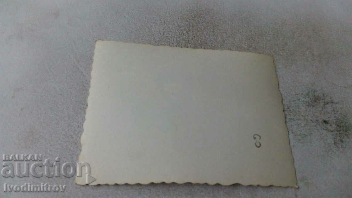 Photo Two men and two women in front of a church entrance with price 1.35 BGN | € 0.69 Photo Two men and two women in front of a church entrance with price 1.35 BGN | € 0.69