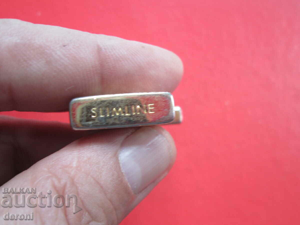Slim gold-plated lighter with price 10.00 BGN | € 5.11 Slim gold-plated lighter with price 10.00 BGN | € 5.11