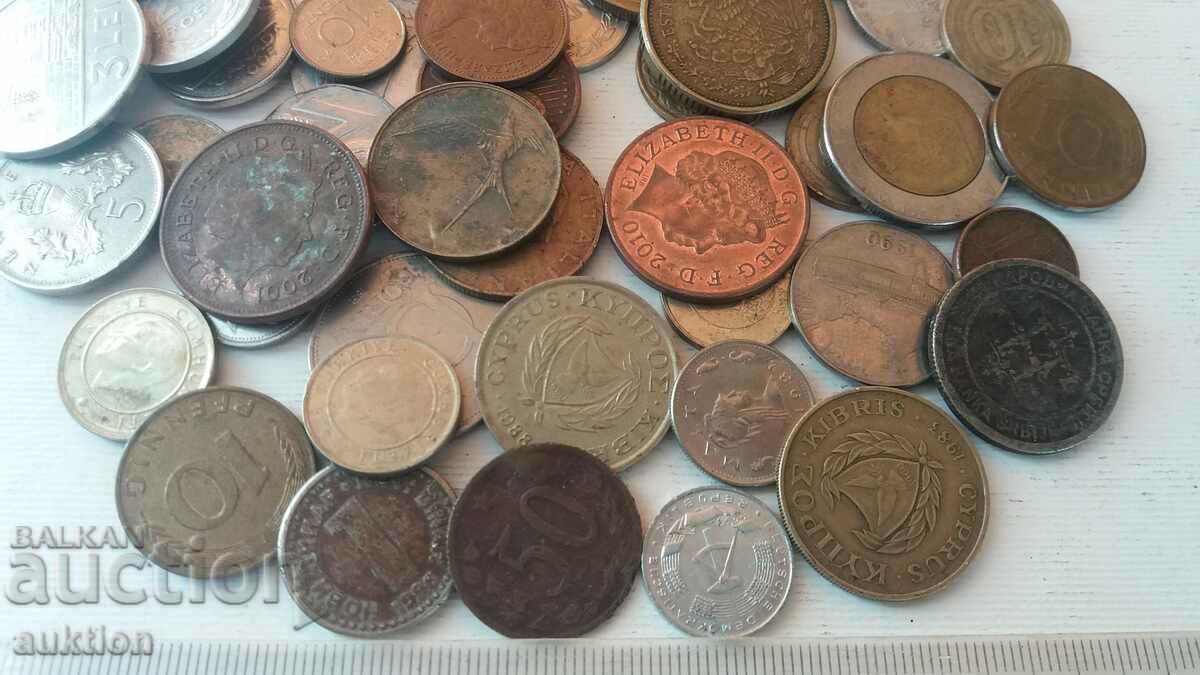 Auction  A COLLECTION OF 50 FOREIGN COINS FROM AROUND THE WORLD