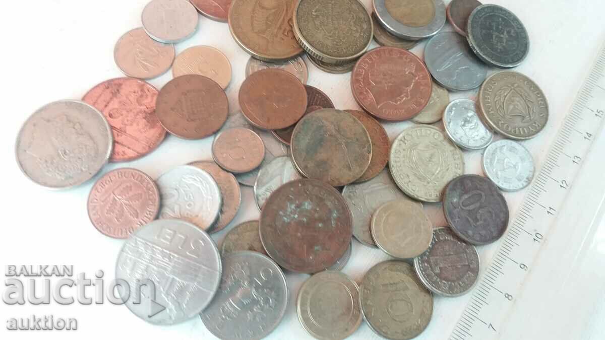 A COLLECTION OF 50 FOREIGN COINS FROM AROUND THE WORLD