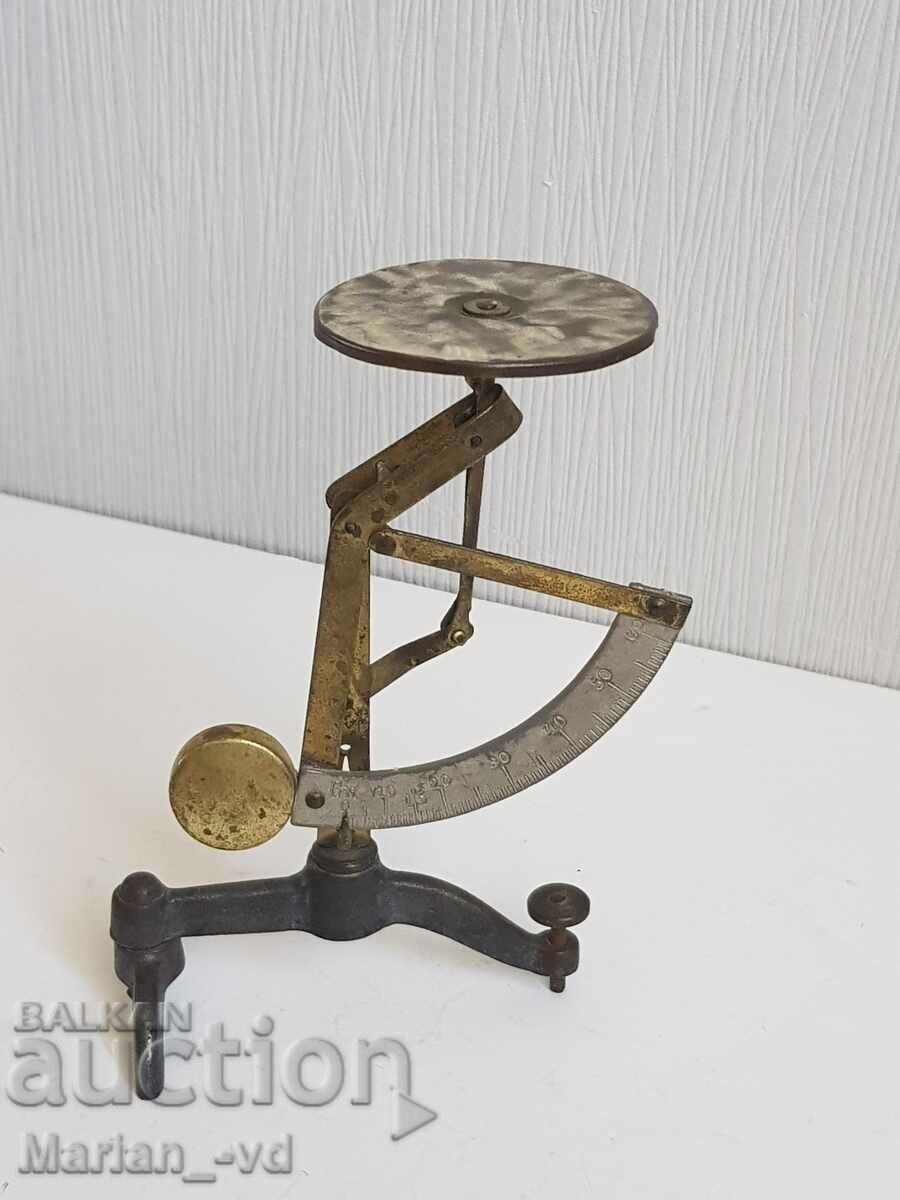 Delivery of Old small postal scale Delivery of Old small postal scale