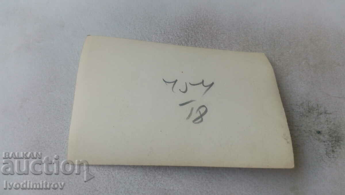 Photo Woman in front of a rest station with price 0.85 BGN | € 0.43 Photo Woman in front of a rest station with price 0.85 BGN | € 0.43