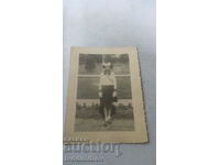 Φωτογραφία Σοφία Ένα νεαρό κορίτσι με σχολική στολή στο πάρκο 1939