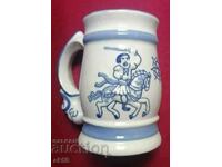 Old unique porcelain mug.